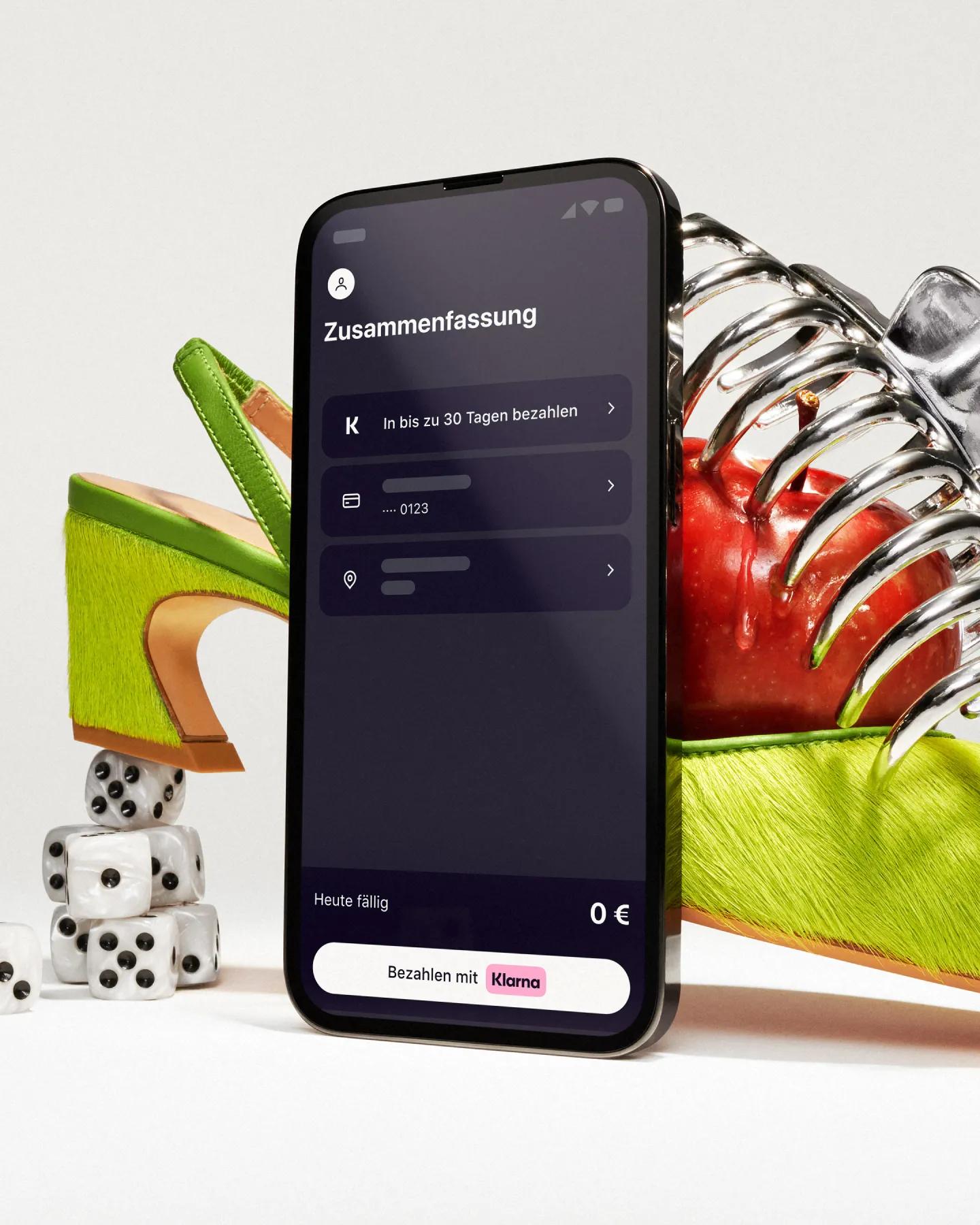 Standing phone in front of an artistically styled shoe